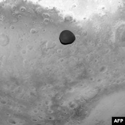 Sonda de asteroide captura imagens raras da lua de Marte